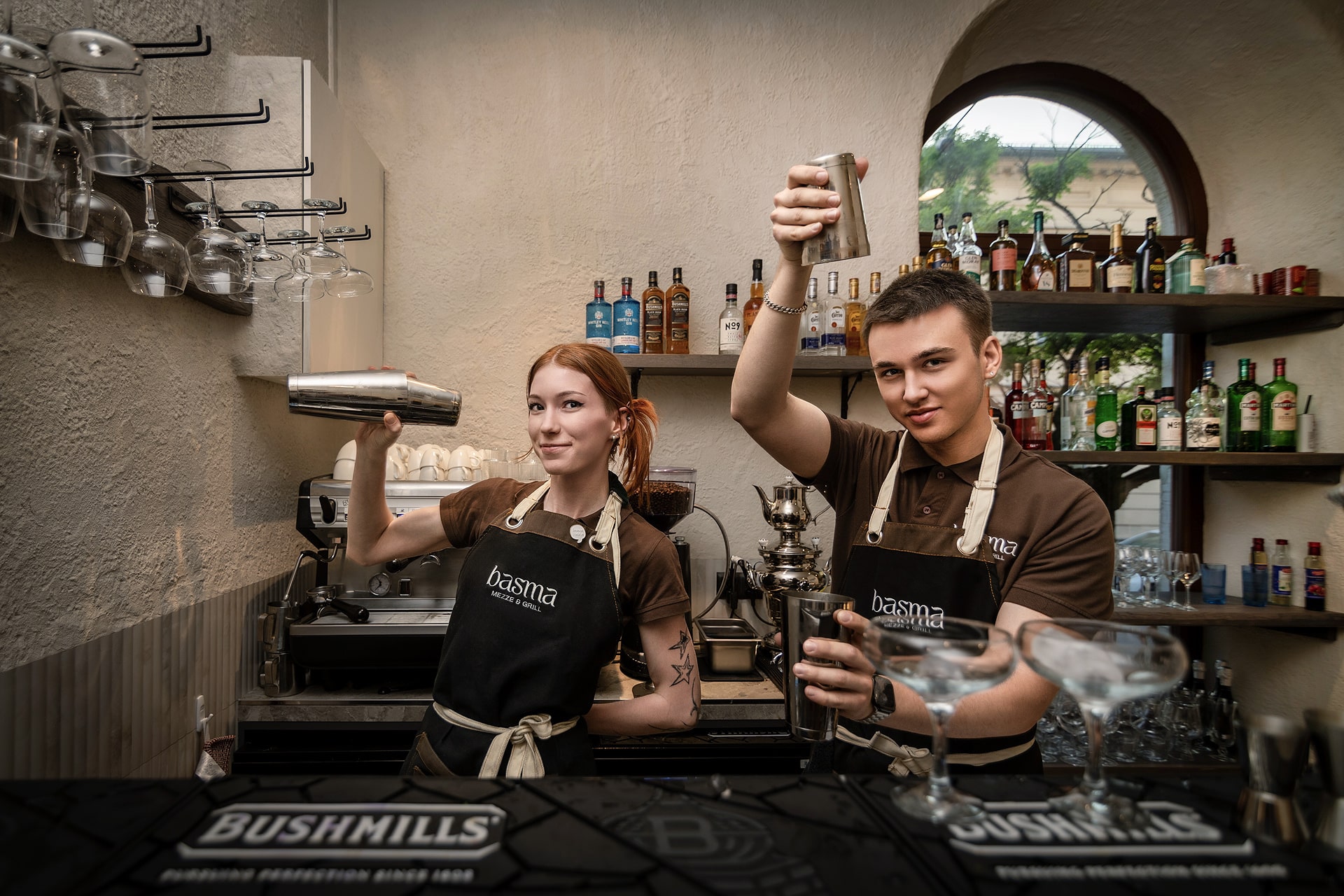 Professional bartenders at Basma restaurant preparing cocktails